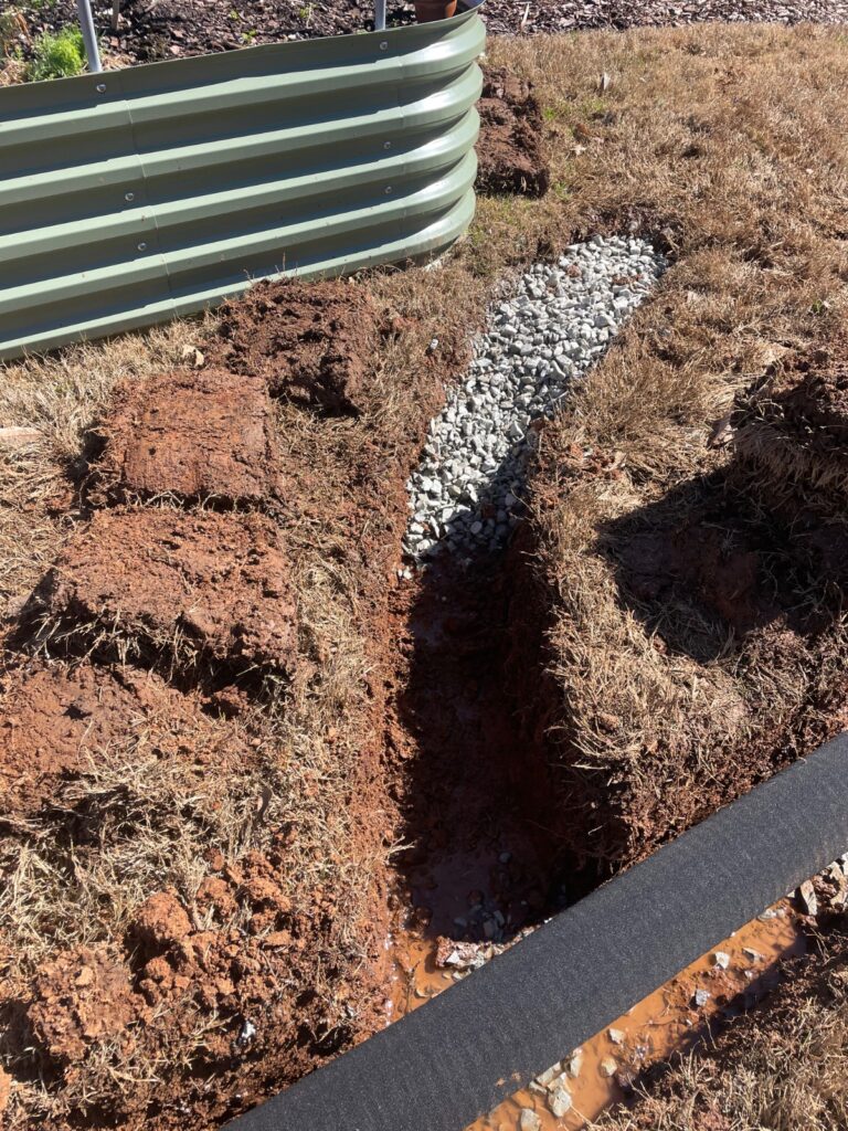 Yard drainage system by PHES Landscaping