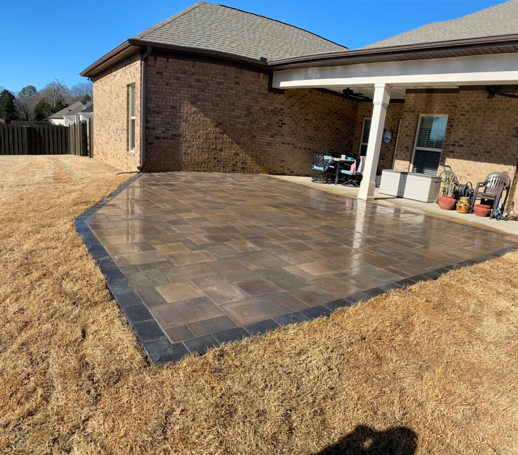 Backyard paver patio by PHES Landscaping
