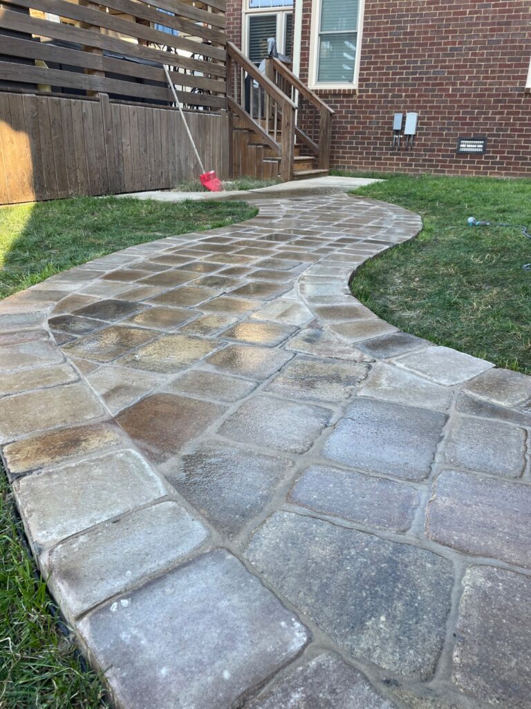 Curved paver walkway by PHES Landscaping